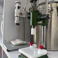 دستگاه درب بند ادکلن