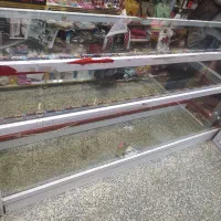 میز فروشگاه دو طبقه همراه با شیشه