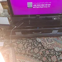 میز تی وی شیشه ای مشکی