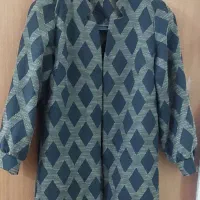 تعدادی مانتو و لباس