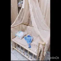 تخت گهواره ای نوزاد
