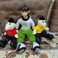 تعدادی عروسک|اسباب‌‌بازی|کهنوج, |دیوار