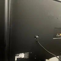 تلوزیون LG 47 در حد نو همراه با میز تلوزیون