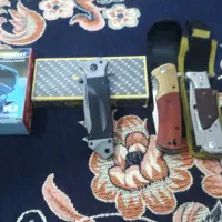 ایرپاد بهمراه چاقو کمپینگ وساعت مچی