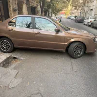 دنامدل ۹۵ تیپ ۲ ابنوس قهوه ای بدون رنگ|خودرو سواری و وانت|تهران, شمس‌آباد|دیوار