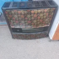 تعدادی بخاری و اجاق گاز