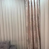 کنار پرده ای دو عدد