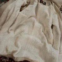 کاپشن|لباس|اصفهان, باغ فدک|دیوار