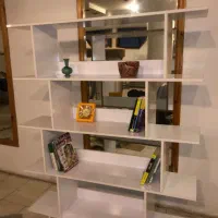 شلف  و دکور  کتابخانه  های گلاس سفید