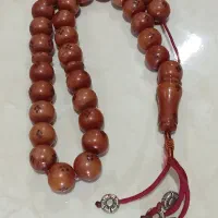 تسبیح کهربا خال خورده