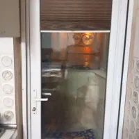 پرده پشت دری بالکن