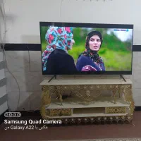 میز تلویزیون برنجی برای تی وی ۵۵ ساعت برنجی