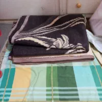 چند عدد پتو|رختخواب، بالش، پتو|بابل, |دیوار