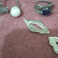 دو عدد انگشتر نقره 925و تعدادی گل نقره