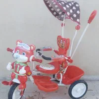 سه چرخه و کامیون اسباب بازی