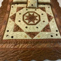 روتختی دو نفره نو با سه بالش پر شده