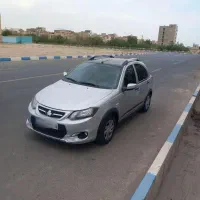 کوییک r پارس خودرو(مانیتور ،دوربین دنده عقب ،رینگ)