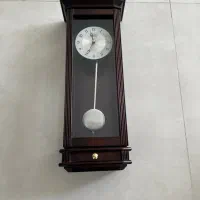 ساعت دیواری چوبی و کناره طوسی لطفاورق بزنید