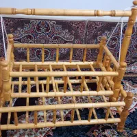 گهواره تابی چوبی سبک درحد نووکریر