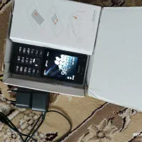 گوشی نوکیا 216 درحد نو و ساعت هوشمند
