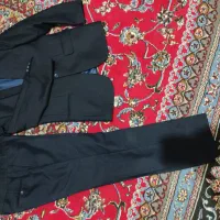 یک عدد کت و شلوار بچه گانه