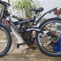 دوچرخه دو دیسک جفت کمک دنده ای مارک OLYMPIA درحدنو