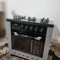 اجاق گاز طرح فر صفحه شیشه ای کاملا سالم در حد نو
