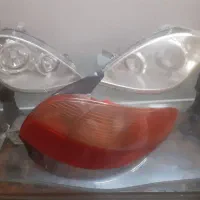 خطر عقب ۲۰۶ سمت شاگرد درجه ۱ و ۱ جفت چراغ جلو تیبا