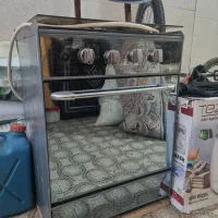 اجاق گاز ۴شلعه طرح فر،مینی واش، تلویزیون