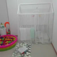 تخت نوزاد چوبی طرح کلبه