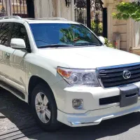 لندکروز مدل 2012 فول عمان با مانیتور سقفی