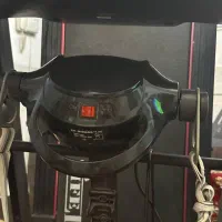 یک دستگاه تردمیل فول امکانات همراه باویبره کمربند