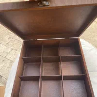 جعبه چوبی و اتو مو