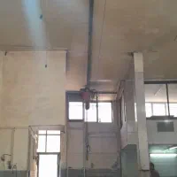 مغازه تجاری ۹۰متری بر خیابان کهندژ ارتفاع سقف ۴م