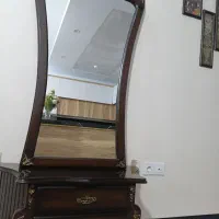 آینه و کنسول و به همراه شمعدان