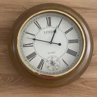 ساعت دیواری چوبی لوتوس