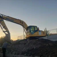 بیل مکانیکی.   Pc200 .زنجیری در حد