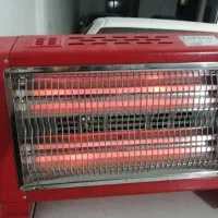 بخاری برقی فن دار تکسان