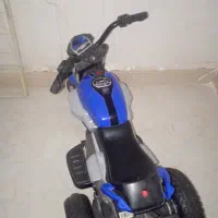 یک عدد موتور شارژی موزیکال و دوچرخه
