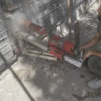 کرگیری وبرش بتن وکاشت بلت میلگرد