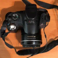 دوربین عکاسی کانن وپرژکتور فیلمبرداری