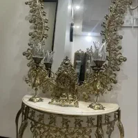 آینه شمعدون بهمراه ساعت کاملا برنج۳۳میللیون تومن