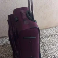 چمدون دسته بلند|کیف، کفش، کمربند|رشت, استقامت ۱|دیوار