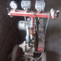 بخاری نفتی کاربراتی و یک شیر دوش دو واحدی