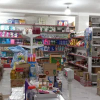 فروش اجناس داخل مغازه ویخچال شیرسردکن وقفسه ها