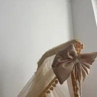 تخت کنار مادر و کالسکه نو