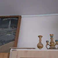 تعدادی مجسمه و دو عدد رادیو قدیمی کلکسیونی|کلکسیون اشیاء عتیقه|اصفهان, باغ دریاچه|دیوار