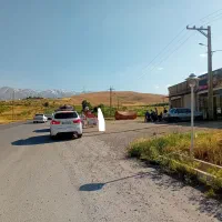 زمین تجاری کنار جاده نهاوند،نورآباد