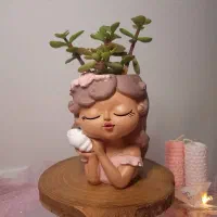 گلدان دختر کیوت با گل طبیعی