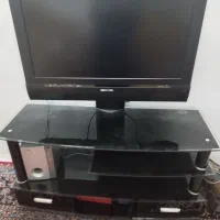 تلوزیون ۳۶ انچ با میز تلوزیون